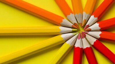 Colored pencils arranged in a starburst shape