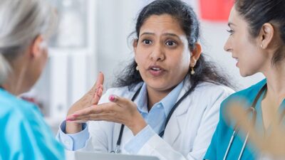 provider talking to colleagues