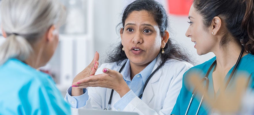 provider talking to colleagues