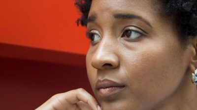 Black woman thinking, looking concerned