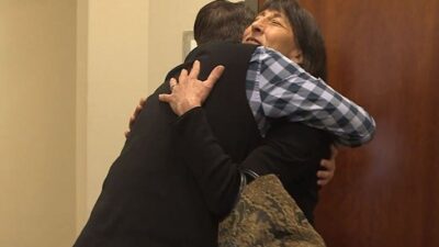 Patient hugs clinician at Chapa de Clinic, in Grass Valley , CA