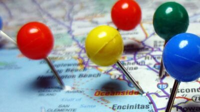 Push pins in a map of Caifornia