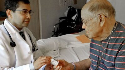 Dr. Parag Agnihotri with patient is Richard Maringer at Sharp Rees-Stealy Medical Group in San Diego.