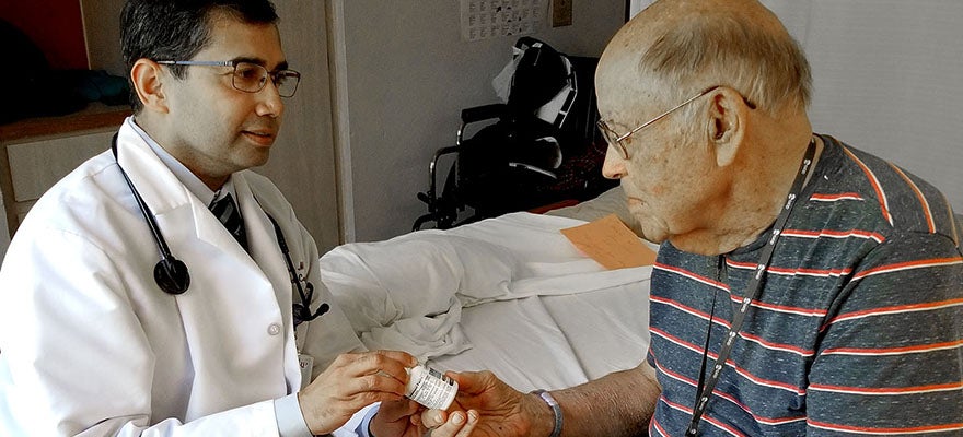 Dr. Parag Agnihotri with patient is Richard Maringer at Sharp Rees-Stealy Medical Group in San Diego.