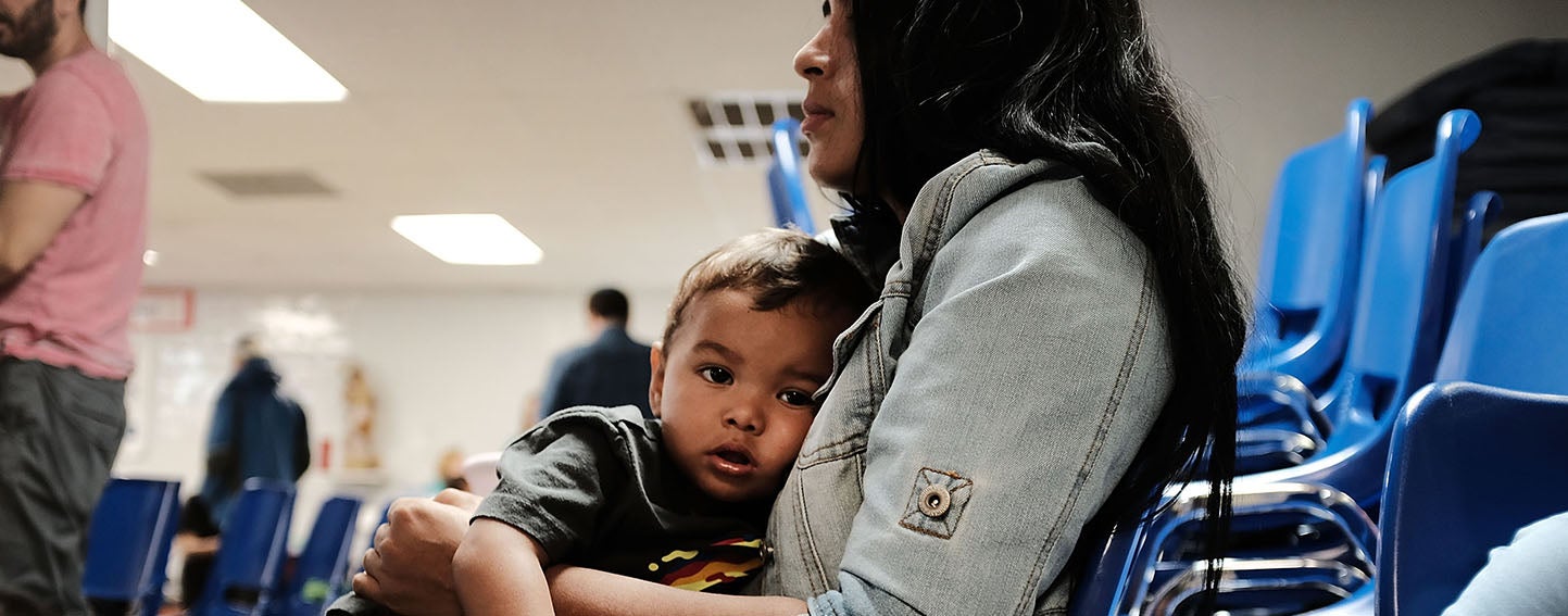 Mother and son at Texas immigrant detention center.