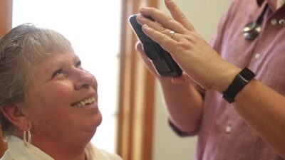 Doctor uses an e-consult with patient