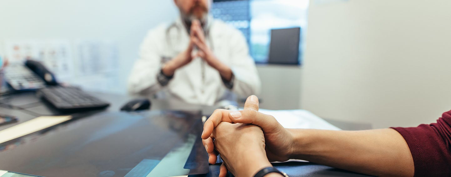 Patient and doctor having a conversation.