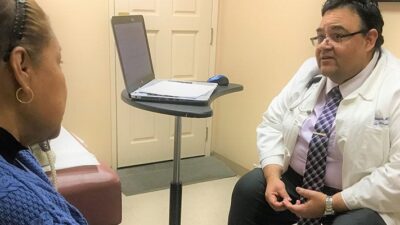 Doctor meets with patient.