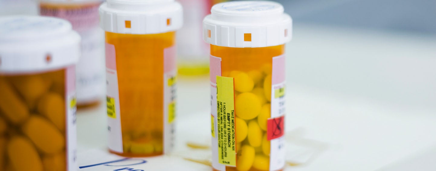 close up of three perscription pill bottles