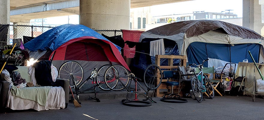 Tents pitched under freeway in Oakland, CA