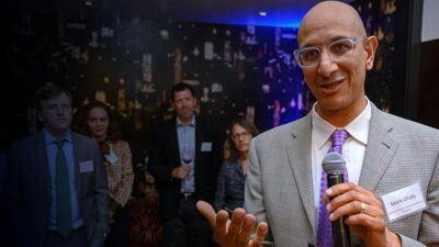Mark Gahly, MD, MPH, secretary of the California Health and Human Services Agency, speaks at a reception.