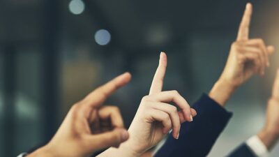 hands raised to ask a question