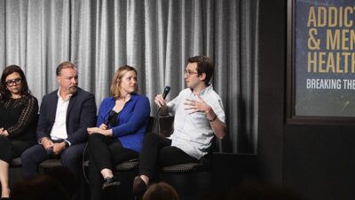 Journalist Zachary Siegel, right, at the Hollywood, Health, and Society event “Addiction & Mental Health: Breaking the Stigma.” Other panelists included, from left, Gemma Baker, co-creator of Mom; Corey Waller, MD, addiction expert; and Holly Daniels, PhD, California Association of Marriage and Family Therapists.