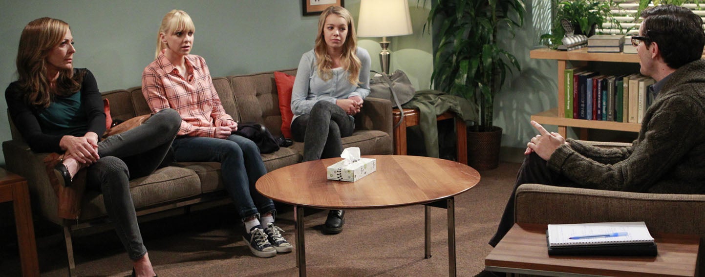 Characters from the Mom television series participate in a group therapy session.