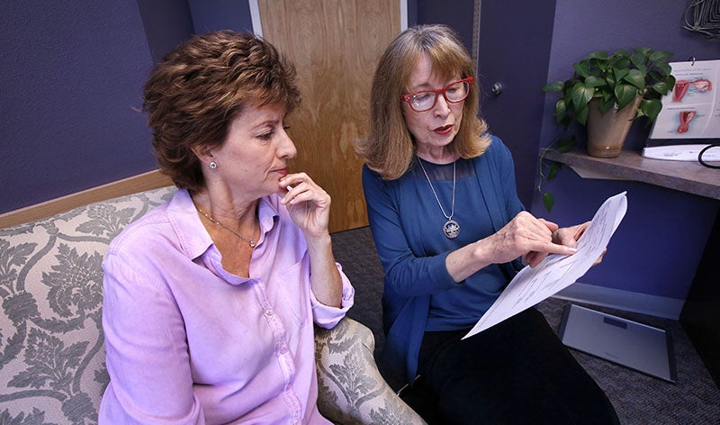 Patient Kim Dinallo consults with Nurse Practitioner Karen Zink, at a clinic in Durango, Colorado. Photo: Jerry McBride