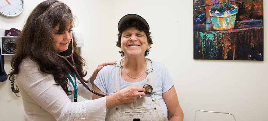 doctor examines patient in a clinic