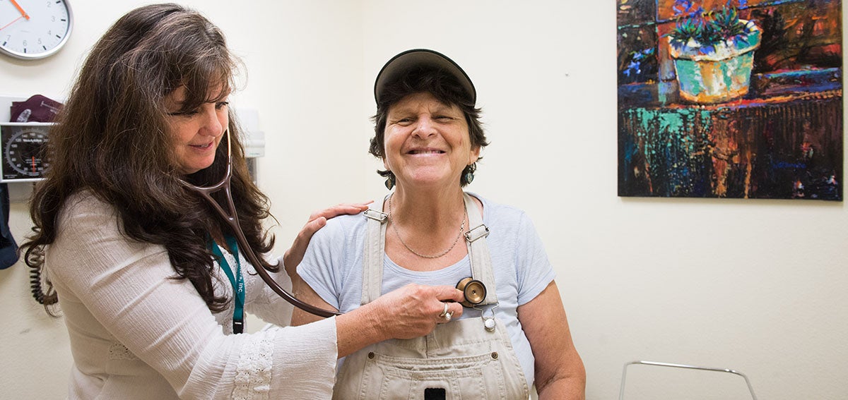 doctor examines patient in a clinic