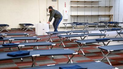 Paul Duncan readies a Salvation Army thrift store to house homeless people.
