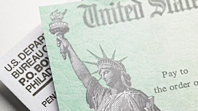 Check and envelope mailed from US Department of the Treasury