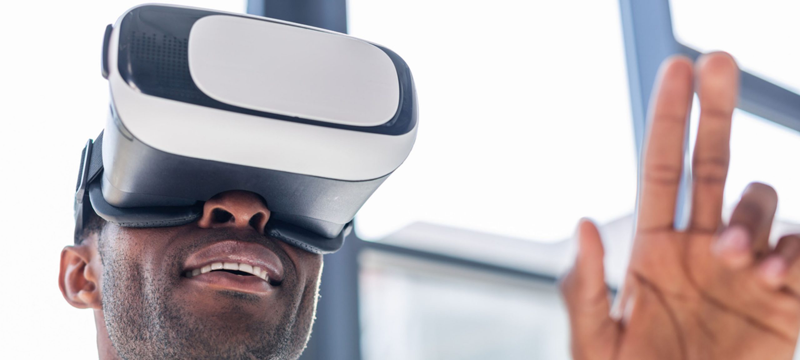 Man testing wearable VR gadget