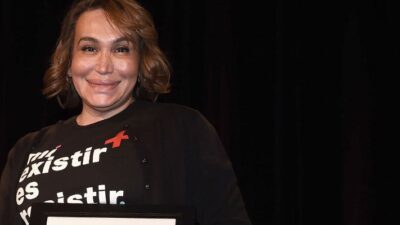 Cecilia Gentili seen on stage during World AIDS Day at Baruch College on November 30, 2018 in New York City. T-shirt reads "My existance is resistance." (Photo by Gary Gershoff/Getty Images for Housing Works)