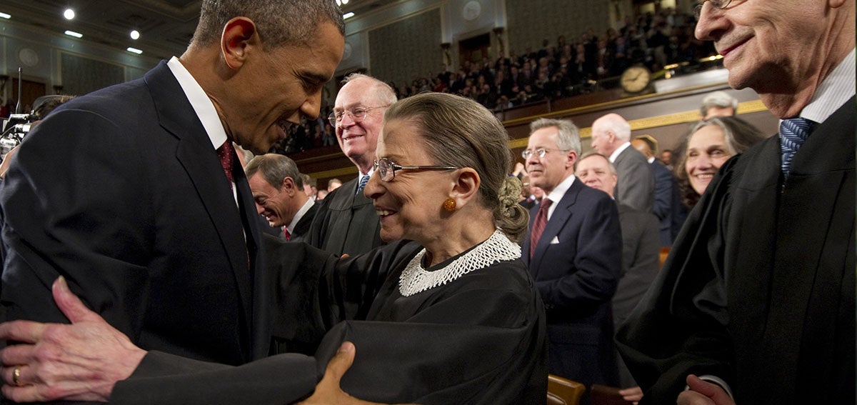 U.S. President Barack Obama greets Supreme Court Justice Ruth Bader Ginsburg