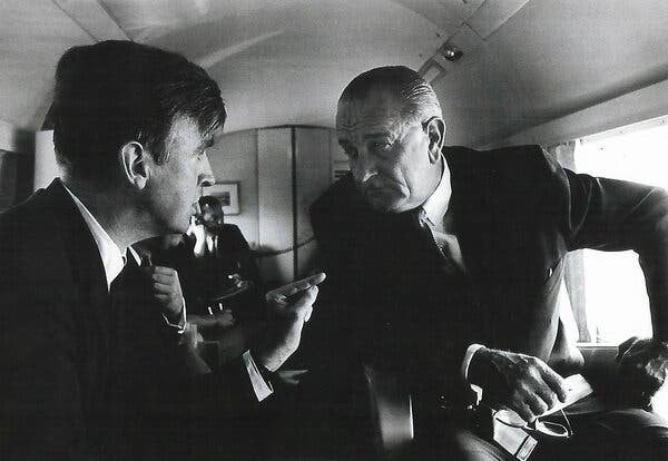 Phil Lee speaks with President Lyndon B. Johnson aboard Airforce One