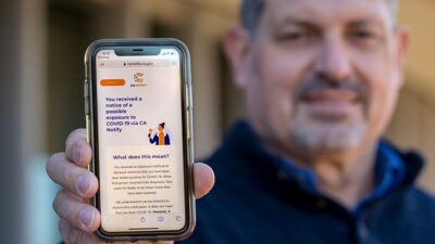 Ken Wottge shows CA Notify alert he received on his phone