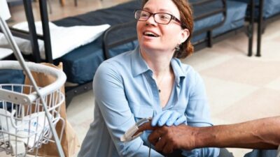 Shannon Smith-Bernardin works with a patient at the San Francisco Sobering Center.