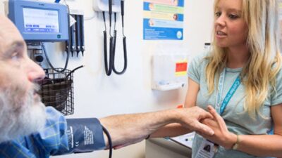 Patient has blood pressure checked at clinic.