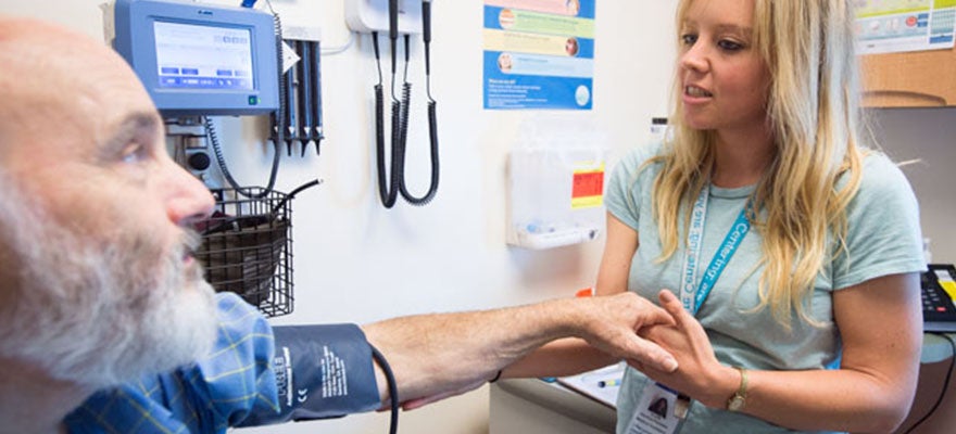 Patient has blood pressure checked at clinic.