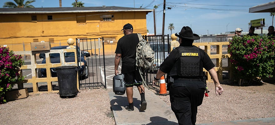 Constable evicts a tenant on October 7, 2020 in Phoenix, Arizona.