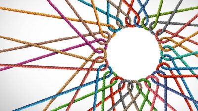 Multicolored strings looped together to form a circle in the middle