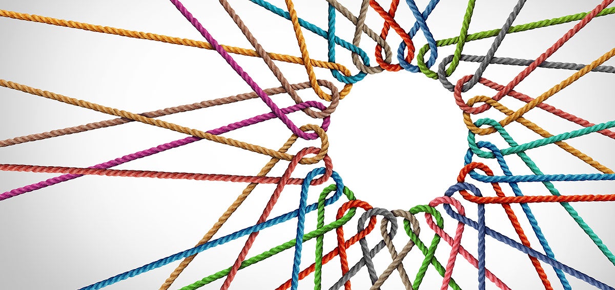 Multicolored strings looped together to form a circle in the middle