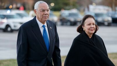 Former Secretary of State Colin Powell and his wife Alma walk into the U.S. Capitol