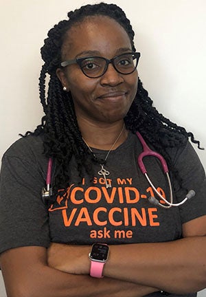 Dr. Tasha Dixon wearing vaccination t-shirt