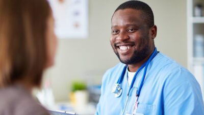 Doctor smiling at patient