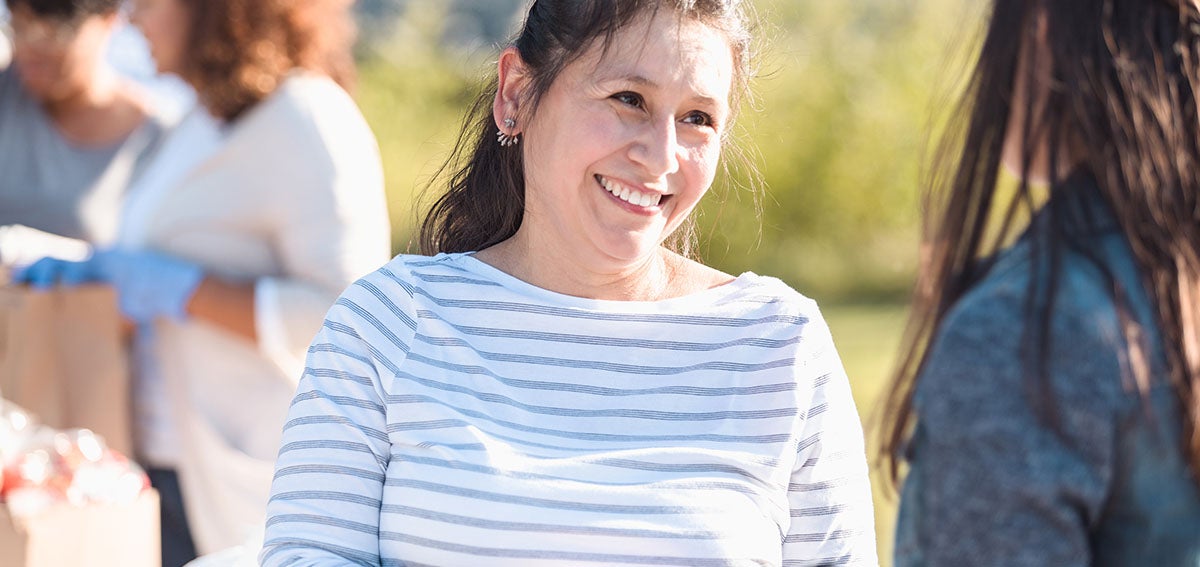 Community Health Worker working at a food drive.