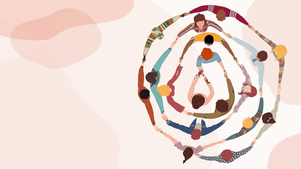 Illustration of many people of various skin tones and bright clothing holding hands in concentric circles.