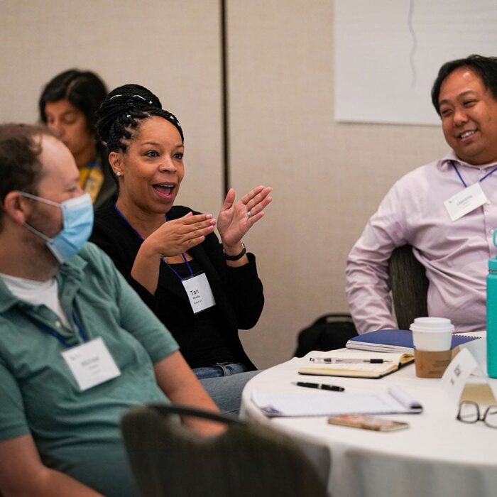 People talking at a conference