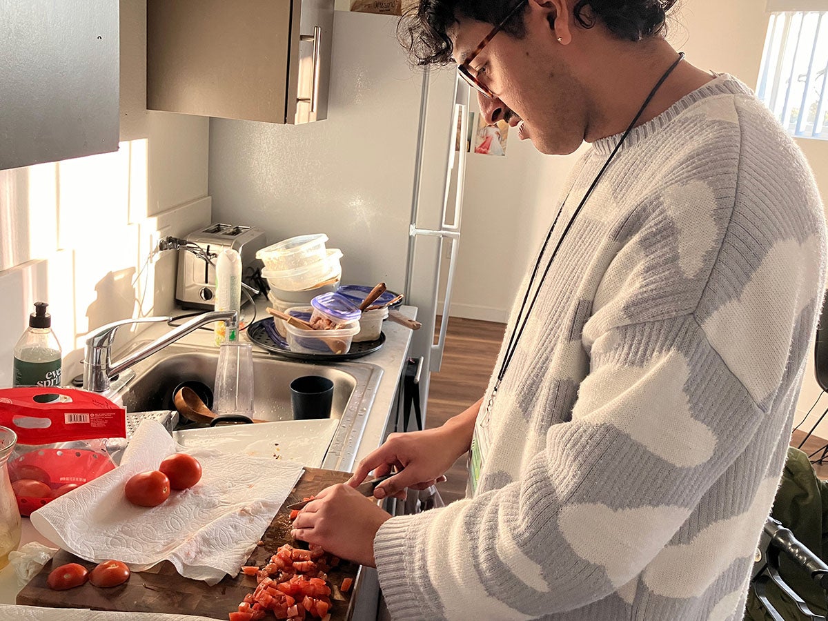 In Los Angeles, occupational therapists like Julian Prado are helping people adapt to indoor living and stay housed.