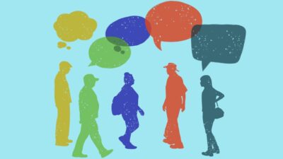 profile of several people walking and talking