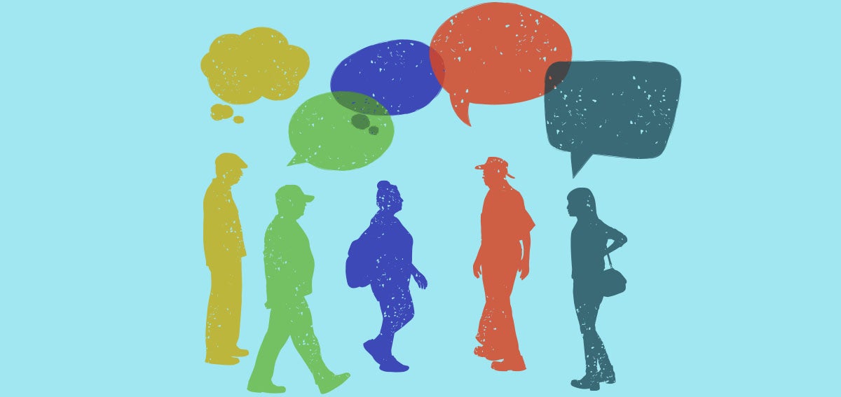profile of several people walking and talking