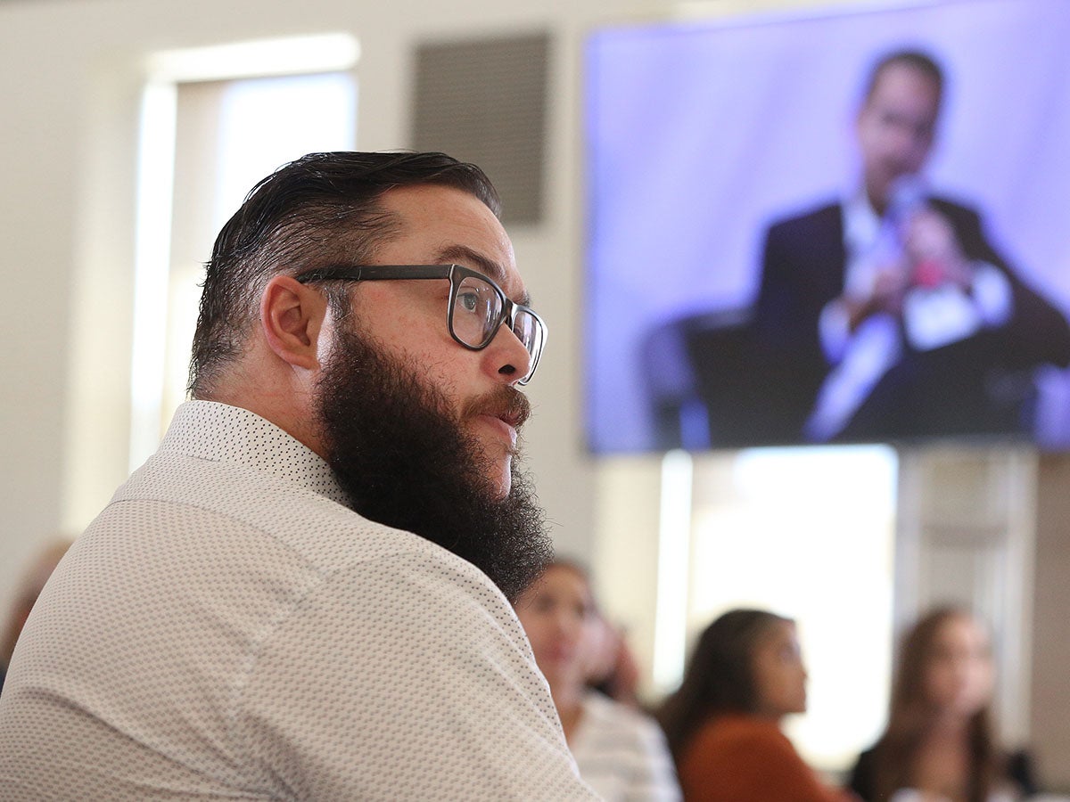 Gabriel Carpio-Bracho, MD, a physician with Pride Sports Medicine in Fresno, listens to a panel discussion at the CHCF event.