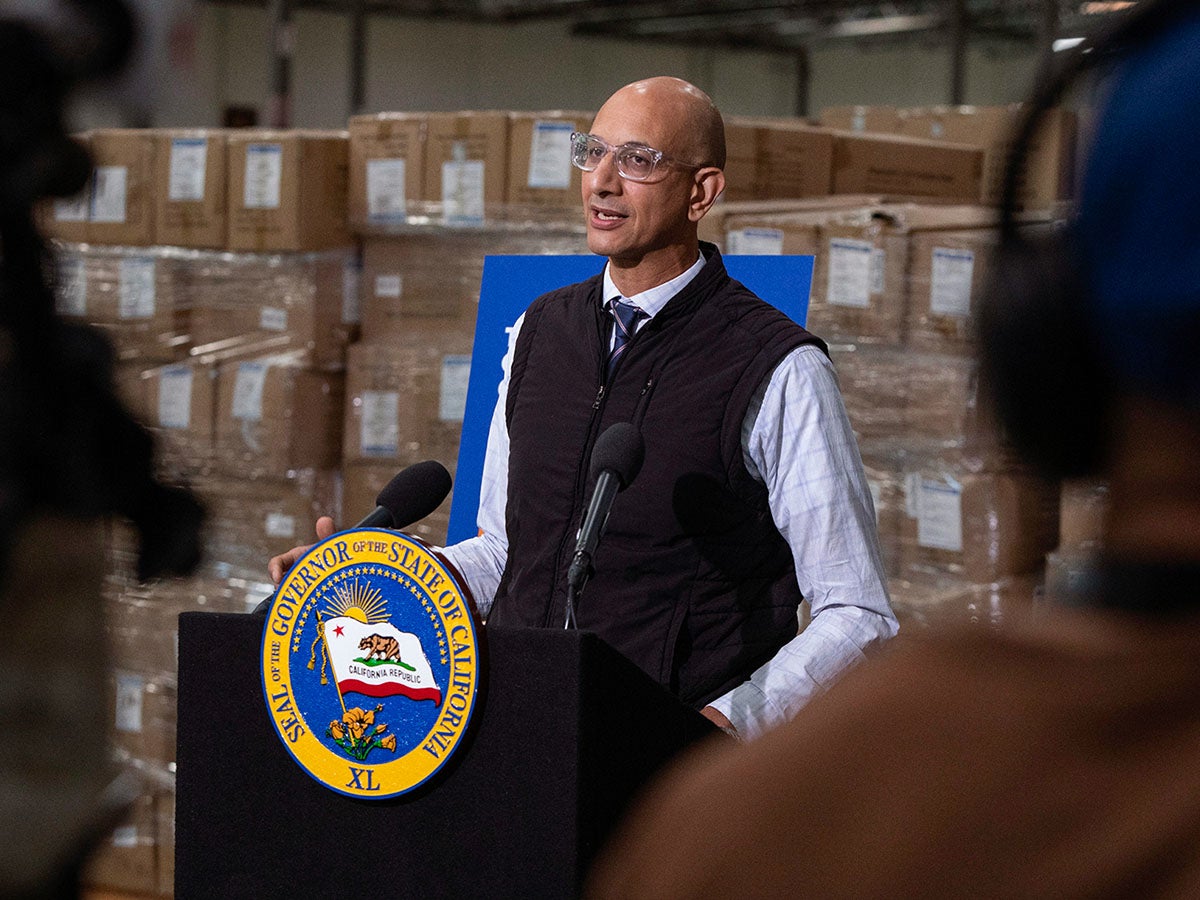 California Health and Human Services Secretary Dr. Mark Ghaly speaks during a press conference in Fontana about the cap on health costs