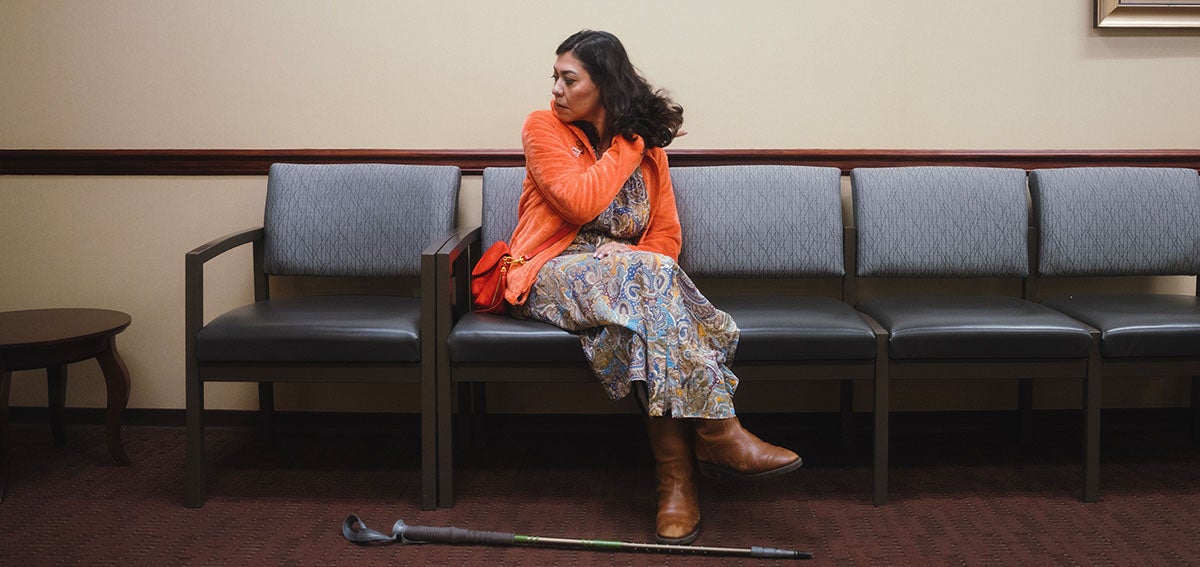 Vickie Villegas sits in the waiting room at the West Coast Neurology office in Pasadena on April 24, 2024. She has faced steep health care costs since she was diagnosed with multiple sclerosis. Photo by Brandon Tauszik for CalMatters sits in the waiting room at the West Coast Neurology office in Pasadena on April 24, 2024. She has faced steep health care costs since she was diagnosed with multiple sclerosis. Photo by Brandon Tauszik for CalMatters