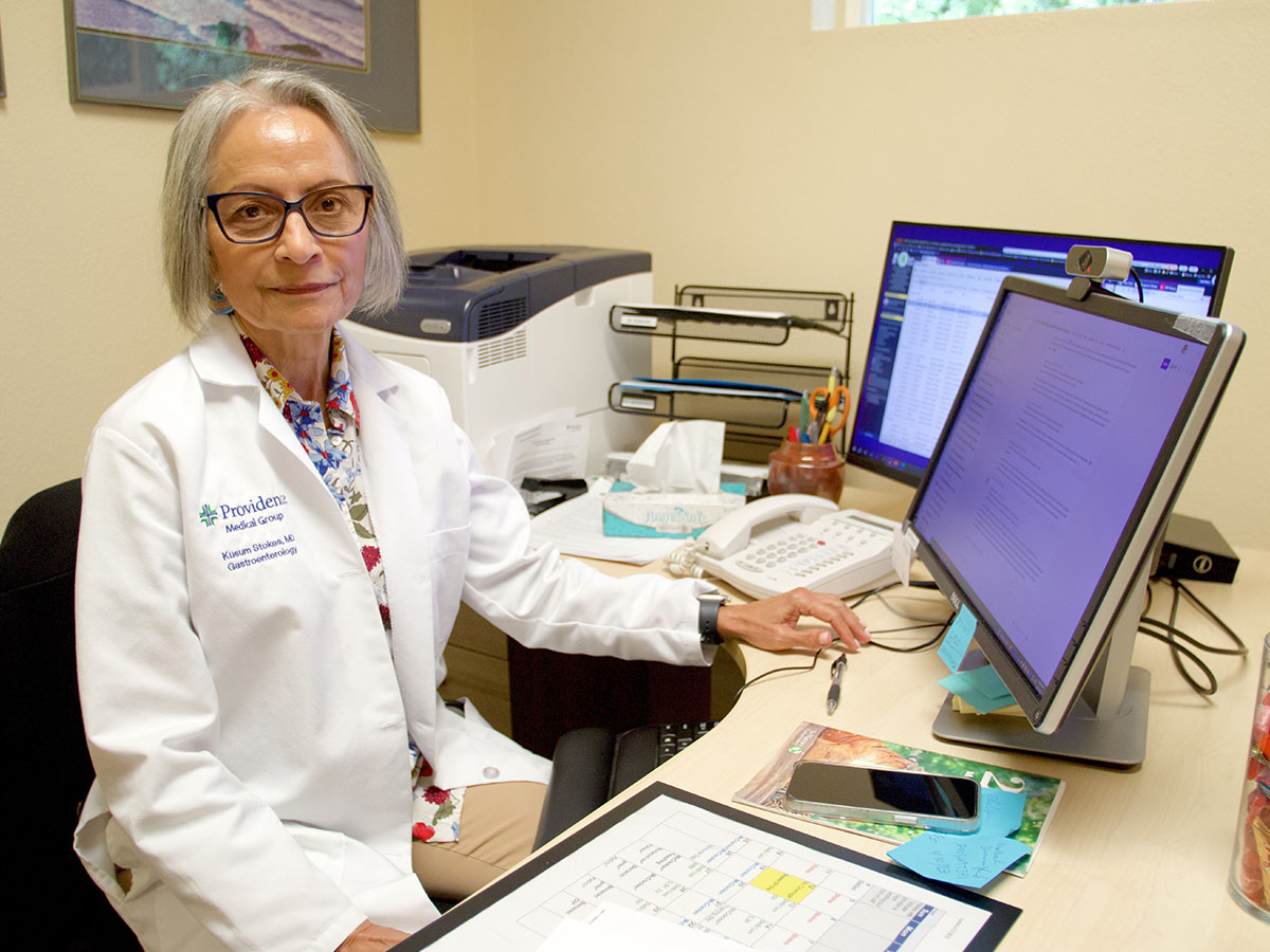 Worsening shortage of rural physicians - Rural doctor seated at her desk