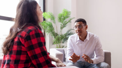 Counselor talks to patient