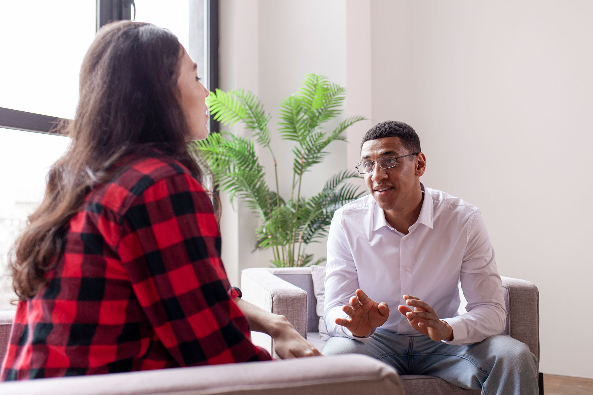 Counselor talks to patient