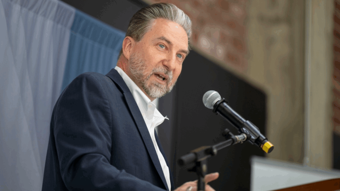 Momentum in health data exchange - a man addresses an audience